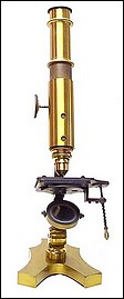 Small French microscope with  lever stage mechanism. 