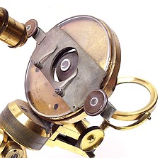 Universal microscope stage and slide holder