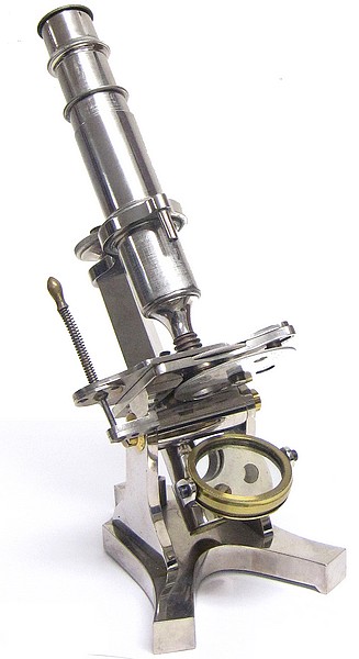 French microscope with lever controlled stage. Nickel plated
