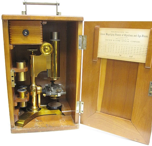 bausch & lomb optical co., serial no. 7516. an uncommon variant of the physician's model microscope with a tripod base, c. 1889. in the storage case