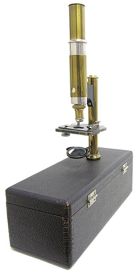 >Signed on the ocular GMO Co. for the The Gundlach Manhattan Optical Co.. The Simplex Model microscope, c. 1910. Case-mounted microscope
