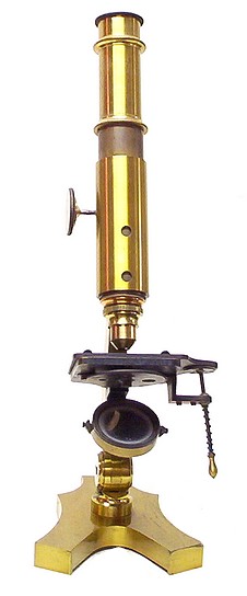 Small French microscope with  lever stage mechanism. c. 1865