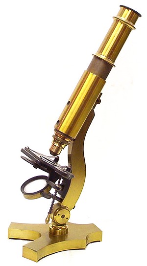 Small French microscope with  lever stage mechanism. c. 1865