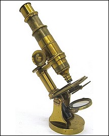 J. Parkes & Son, Birmingham. Monocular microscope with a round base