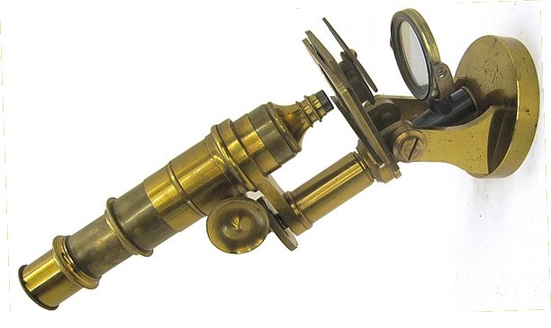 J. Parkes & Son, Birmingham. Monocular microscope with a round base