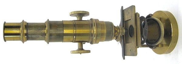 J. Parkes & Son, Birmingham. Monocular microscope with a round base