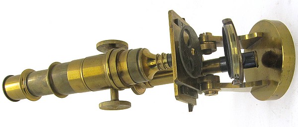J. Parkes & Son, Birmingham. Monocular microscope with a round base